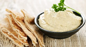 Try something new this year and make your own hummus. Made from five simple ingredients, its name in Arabic literally translates to “chickpeas.” These cream-colored beans are full of protein and rich in fiber. Tahini is ground sesame seed paste that adds creaminess and a distinctive nutty flavor. Hummus can be served with pita bread or used as a dip for raw veggies like carrots, celery and bell pepper slices.