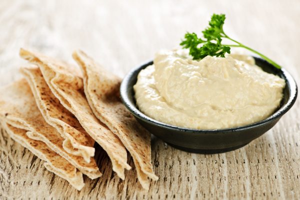 Try something new this year and make your own hummus. Made from five simple ingredients, its name in Arabic literally translates to “chickpeas.” These cream-colored beans are full of protein and rich in fiber. Tahini is ground sesame seed paste that adds creaminess and a distinctive nutty flavor. Hummus can be served with pita bread or used as a dip for raw veggies like carrots, celery and bell pepper slices.