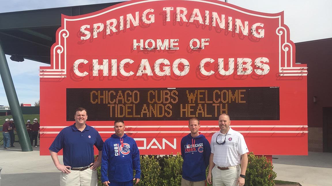 Dr. Douglas Swartz (far left) and Dr. William Greer (far right)