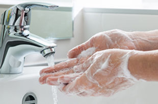 Someone washing hands