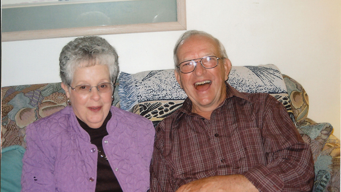 John Hughes shares a laugh with his wife, Doris.