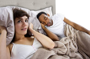 Woman unable to sleep due to snoring partner