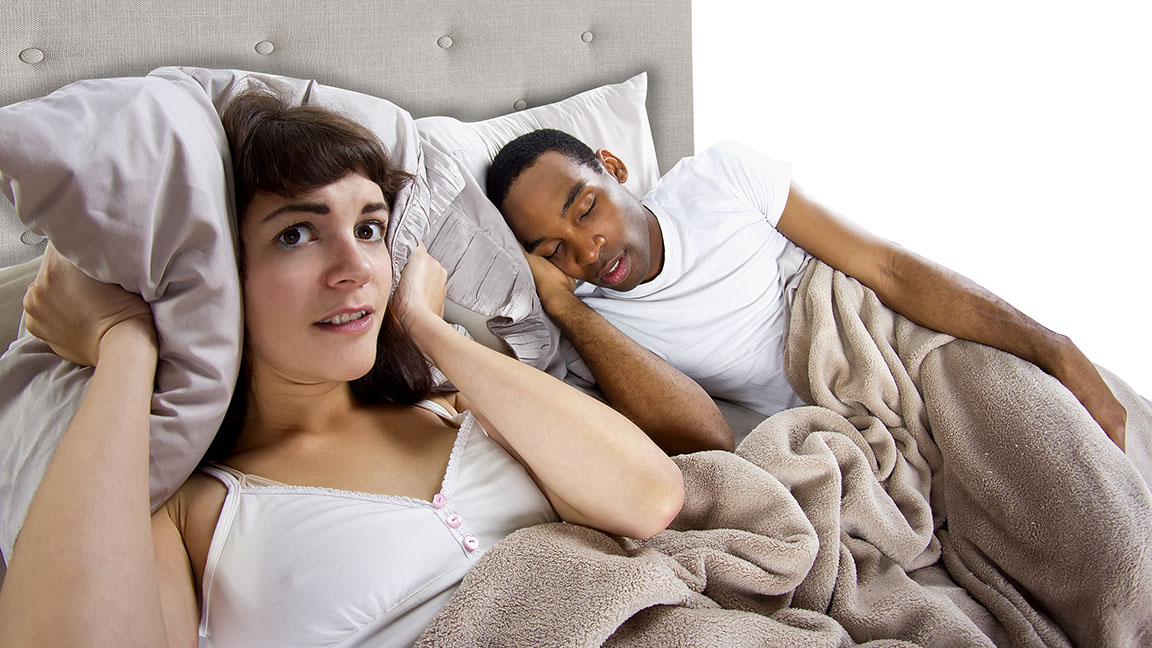 Woman unable to sleep due to snoring partner