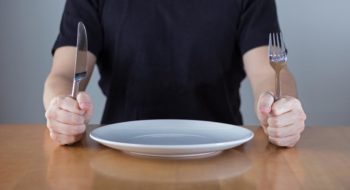 Man with empty plate