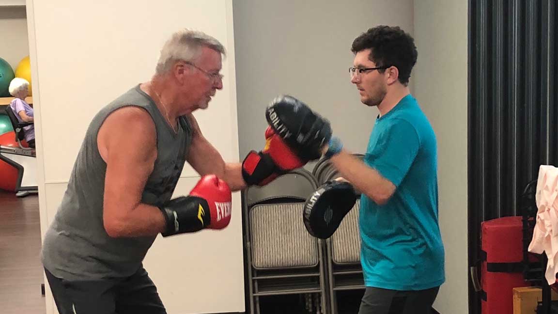 George Brockhausen works out during the "Power Through Parkinson's" class at Tidelands HealthPoint