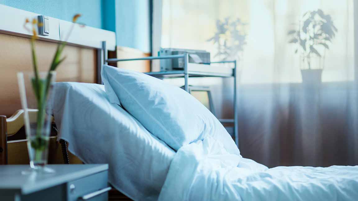 An empty hospital bed