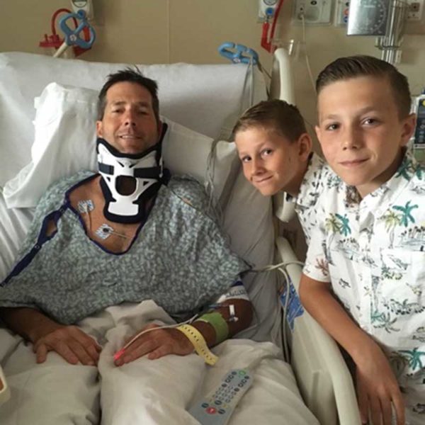 Craig McLeod and his two sons in his room at Tidelands Waccamaw Community Hospital