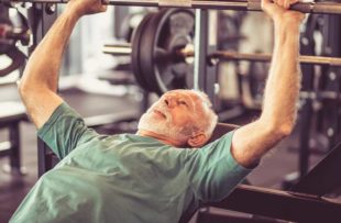 Senior lifting weights