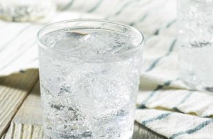 Fresh Spring Sparkling Water with Ice in a Glass