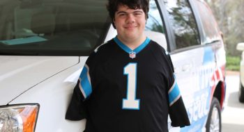Travis Cunningham, who was born without arms, learned to drive with help from Ian McClure, a certified driver rehabilitation specialist with Tidelands Health.