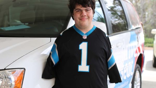 Travis Cunningham, who was born without arms, learned to drive with help from Ian McClure, a certified driver rehabilitation specialist with Tidelands Health.