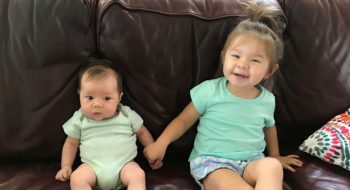 Dr. Monica Selander's oldest daughter Nora, 2, enjoys some time with her baby sister, Luna.