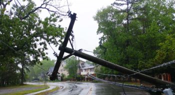 Electric pole knocked down by storm.