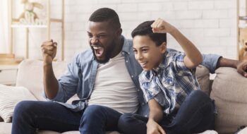 Father and son cheering