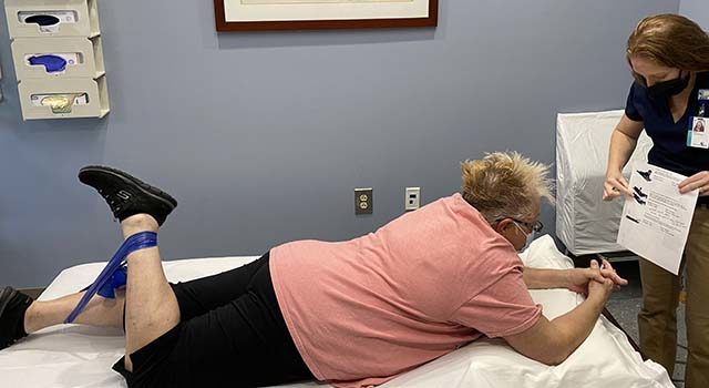 Tidelands Health physical therapist Pam DiGiovanna, at right, provided Overton with a home exercise program that will help her manage her sciatica long term.