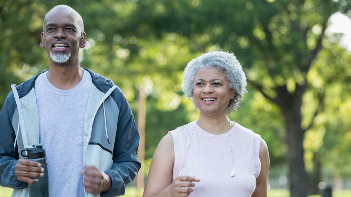 Couple jogging in park