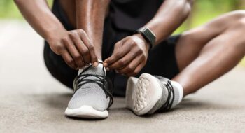 Man tying shoes