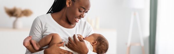 Woman breastfeeding baby.
