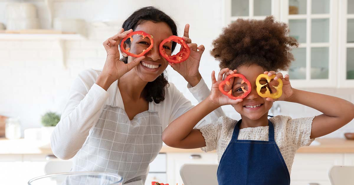 Woman and child eating healthy.