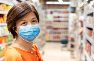 Woman in grocery store.