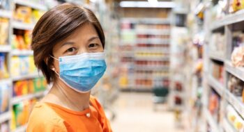 Woman in grocery store.