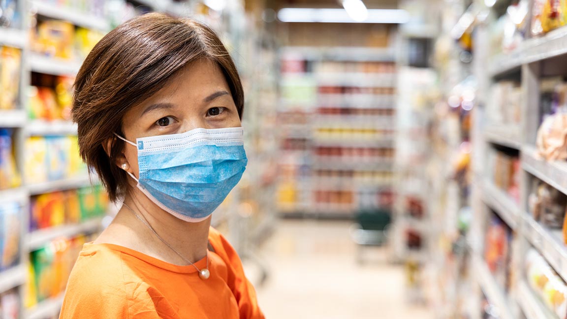Woman in grocery store.
