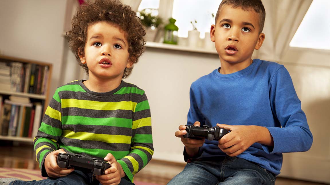 Boys playing video game.