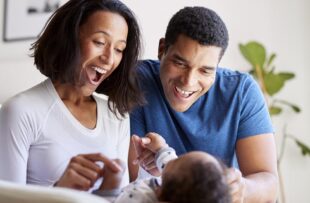 Couple speaking to baby