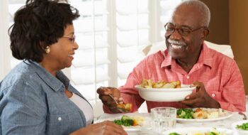 Senior couple enjoying nutritious meal.