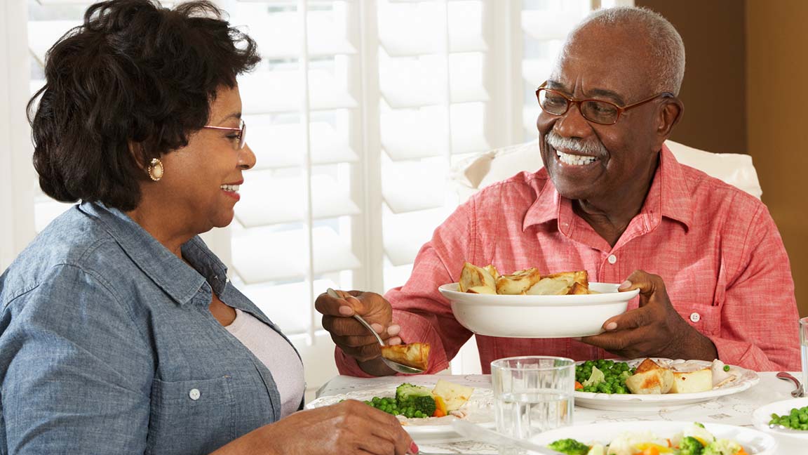 Senior couple enjoying nutritious meal.