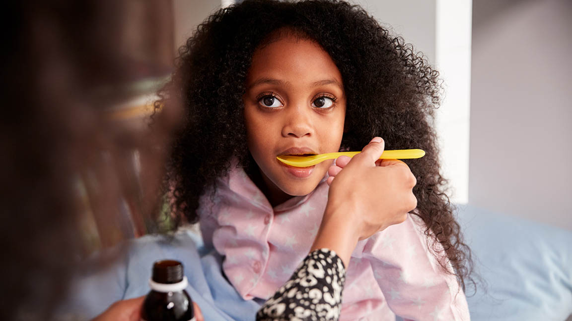 Girl receiving medication