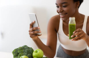 Woman drinking a smoothie.