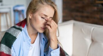 Mom struggling with flu symptoms.