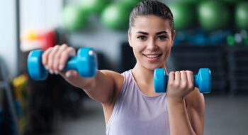Woman working out in the gym.