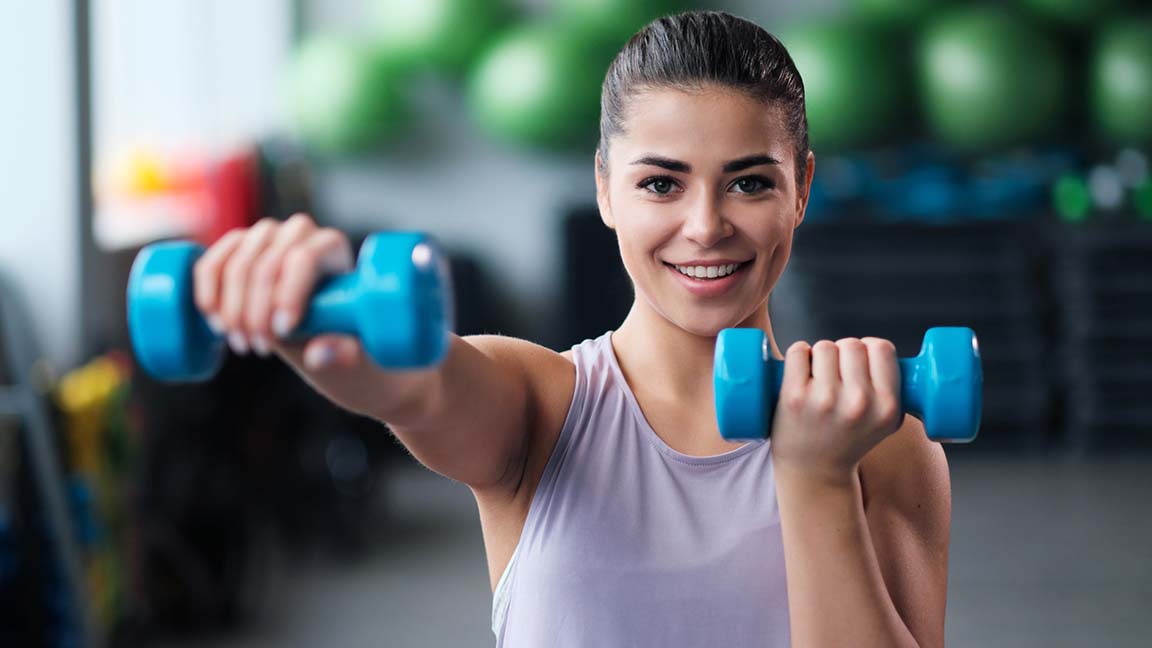 Woman working out in the gym.