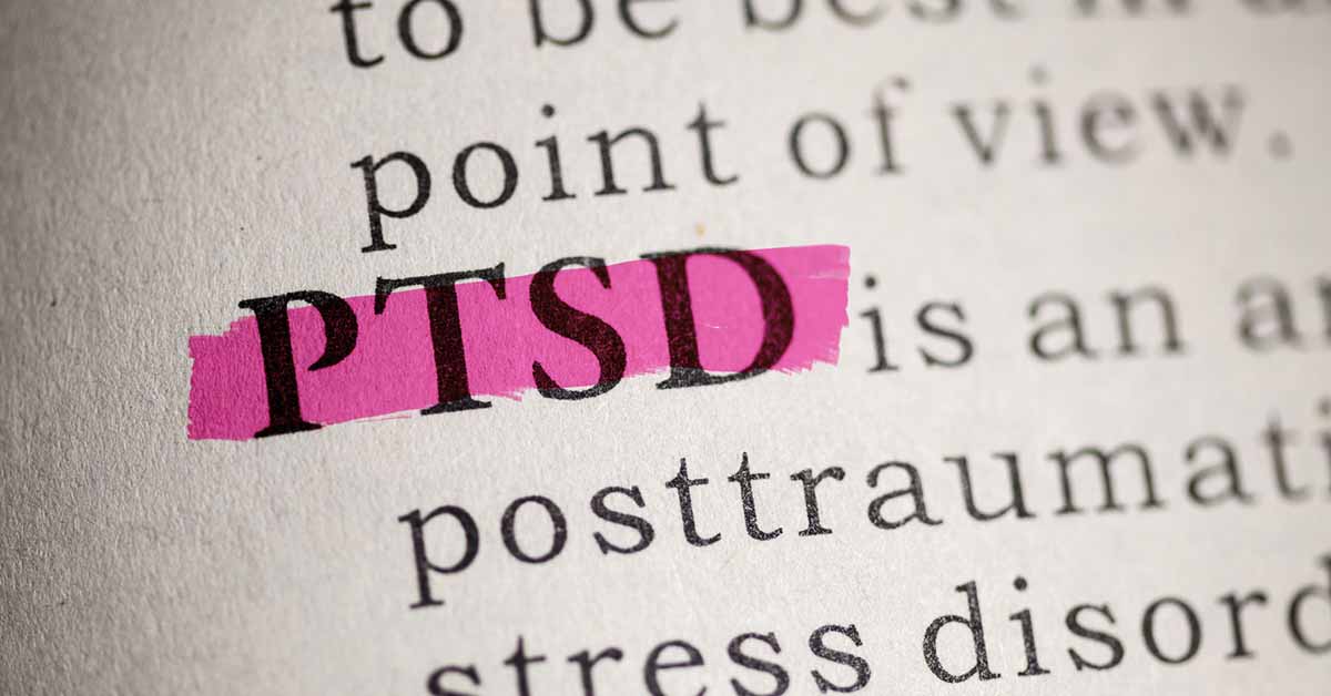 PTSD highlighted in pink in the text of a book