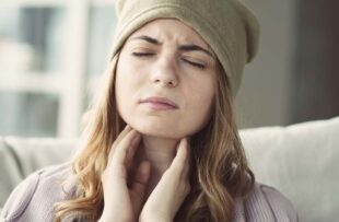 Young woman suffering from cold