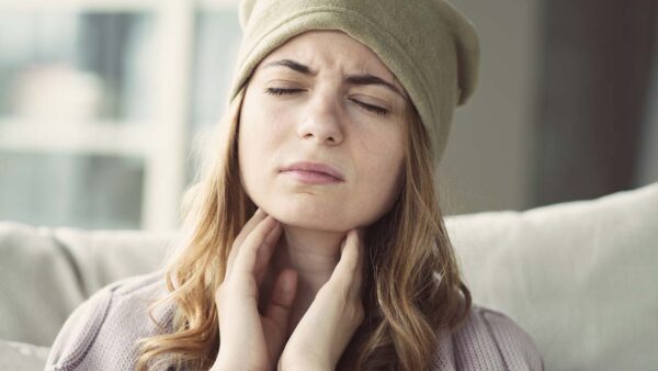 Young woman suffering from cold