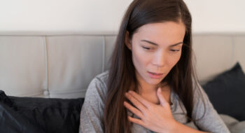 Woman experiencing a panic attack.