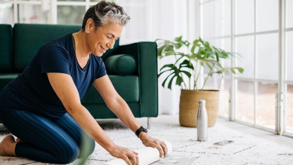 Woman prepares to do exercises.