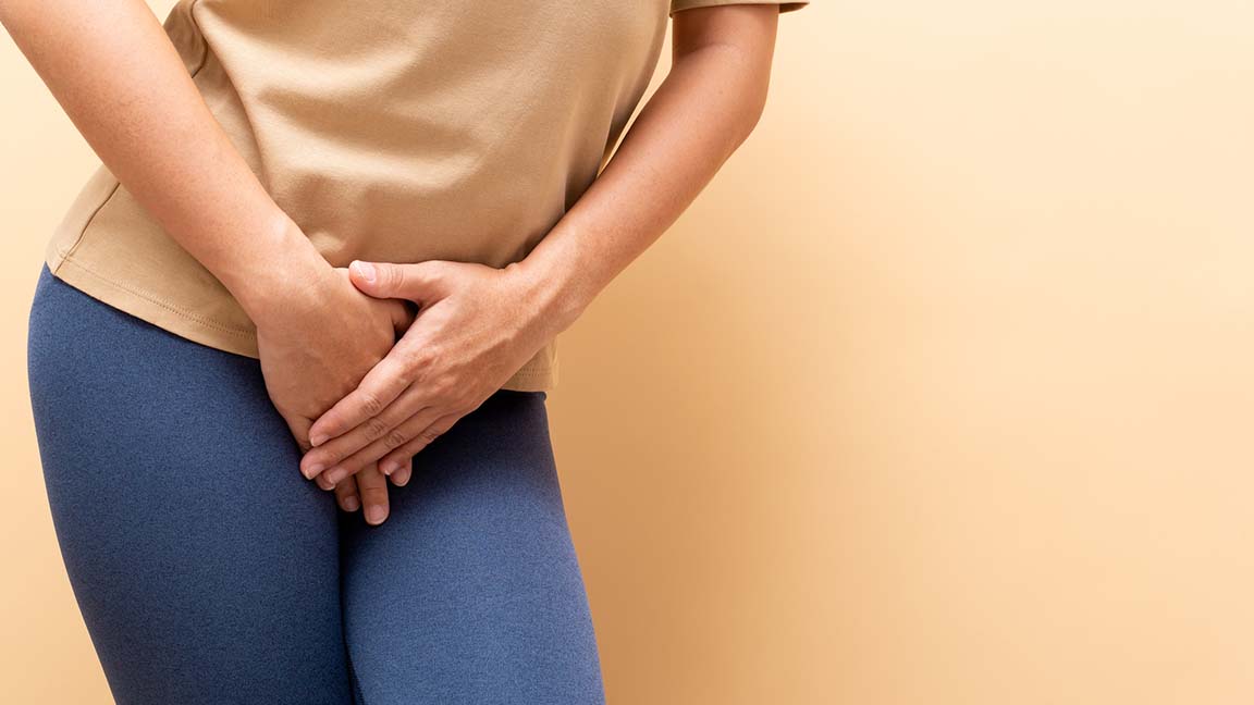 Woman struggling with need to urinate.