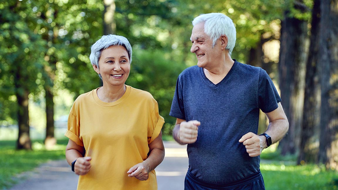 Mature couple jogging