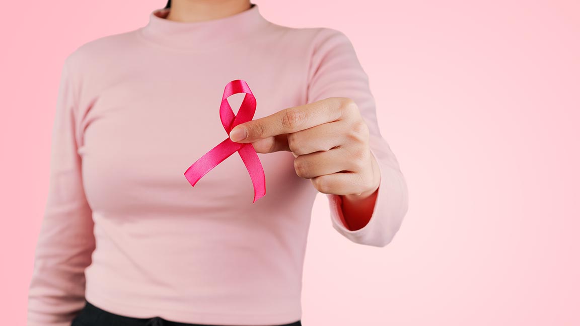 Woman with pink ribbon.