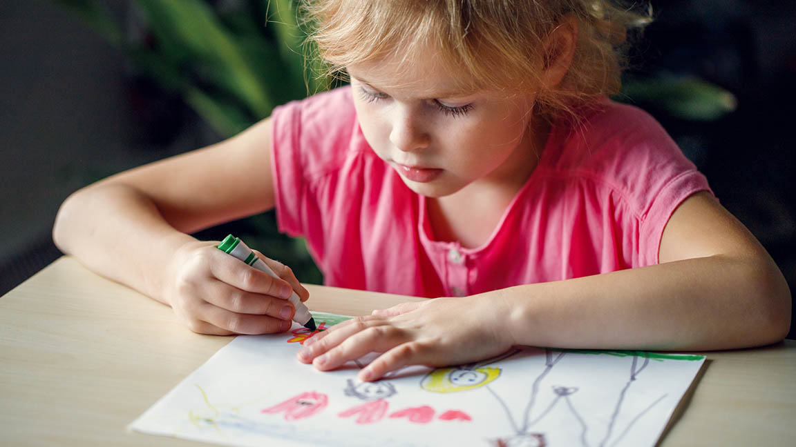 Child drawing a picture.