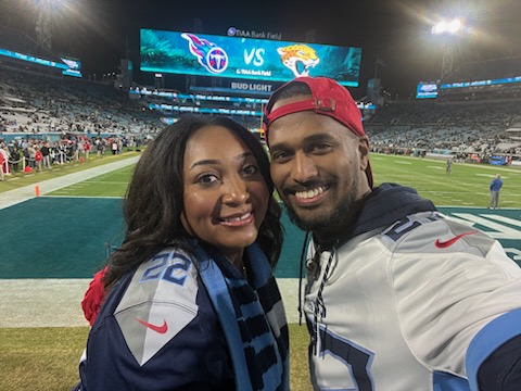 Alexis and Andrew Prue at the Titans football game