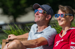Couple enjoying the eclipse together.