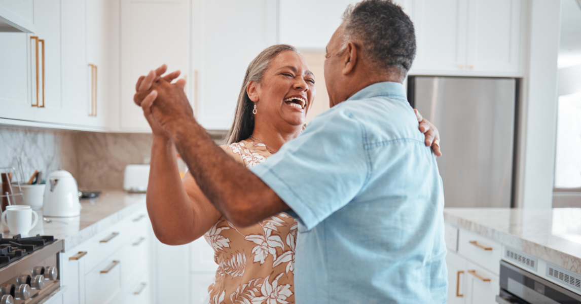 happy older couple dancing