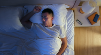young man snores when he sleep at night