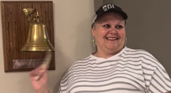 Survivor Sherry Bell rings the bell after she finishes her last radiation treatment.