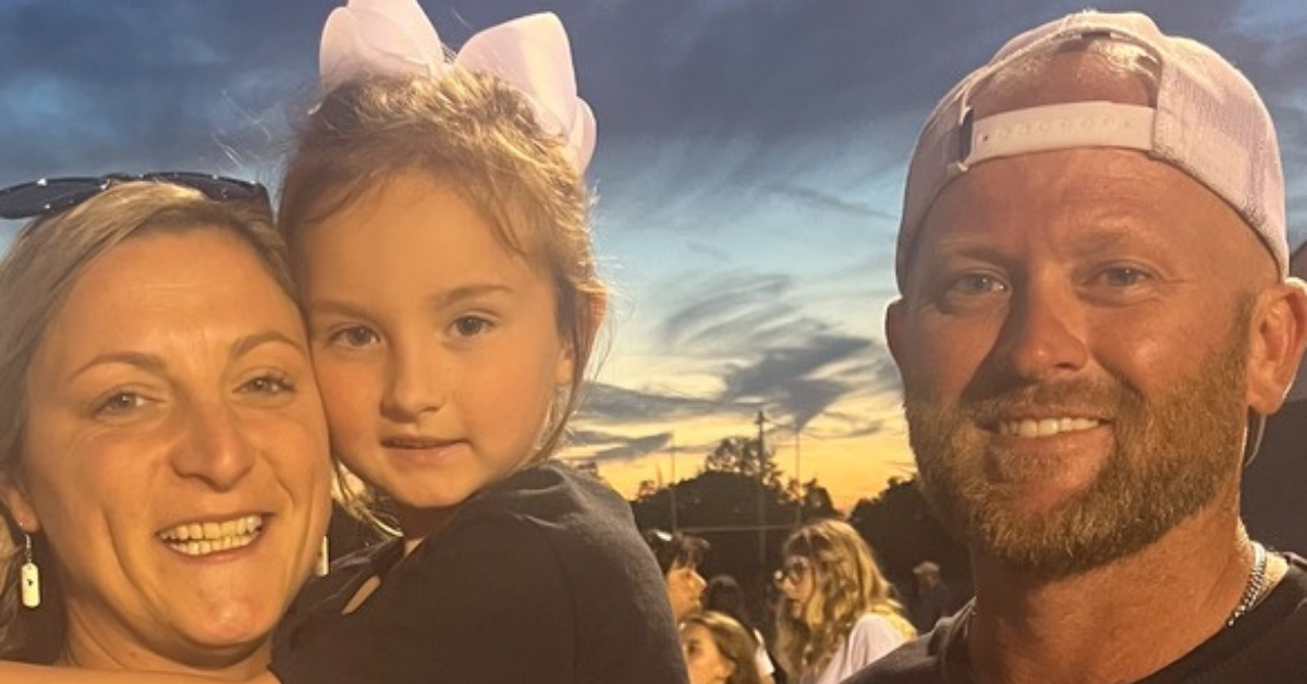 Ryan Baltz with his daughter and girlfriend.